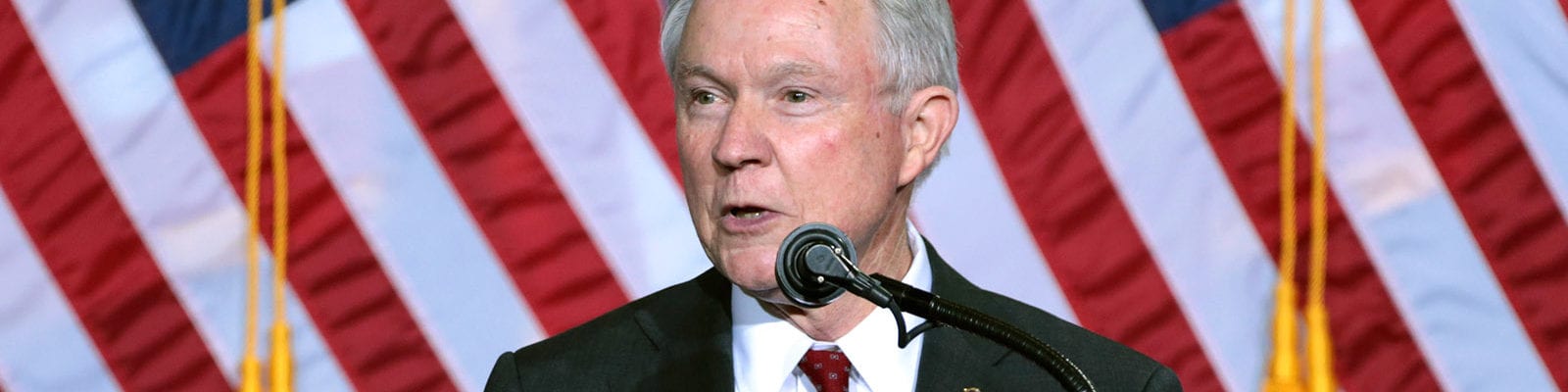 U.S. Attorney General Jeff Sessions speaks to a crowd of GOP supporters during a Trump rally in 2016.