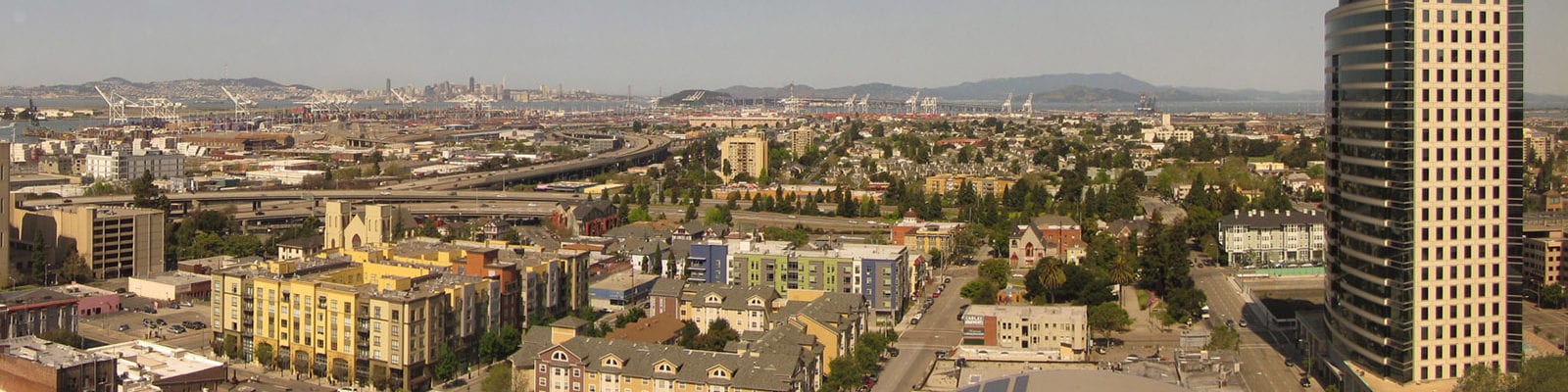 Skyline view of Oakland, California on a clear, sunny day.